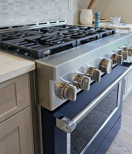 image of a gas cooker being installed
